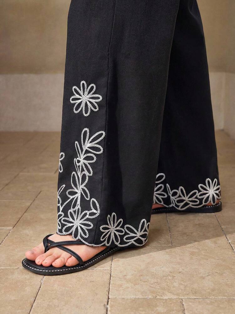 Pantalon costume avec broderie florale en lin