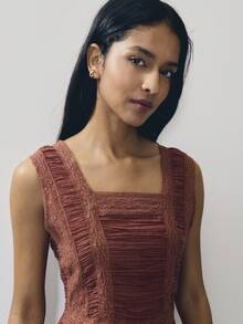 Nöista Sleeveless Top In Rust Brown With A Flattering Square Neckline And Ruffled Shoulder Straps.Smked Bodice Peplum Hem.Perfect For Dinners, Events, Chic - Brown - View 3