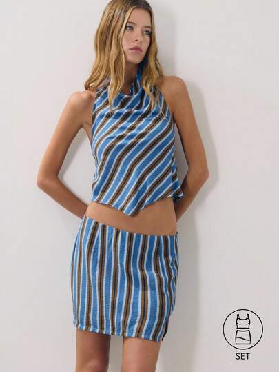 Nöista Striped Two-Piece Set Featuring An Asymmetrical Halter Top With Draped Scarf Detail And Matching Mini Skirt In Blue, Brown And White Tones. Lightweight And Modern, Perfect For Summer Outfits For Women, Vacation Looks, Beachwear Styling, Festival Outfits, Going Out Looks, Holiday Outfits Or Casual Chic Summer Sets.