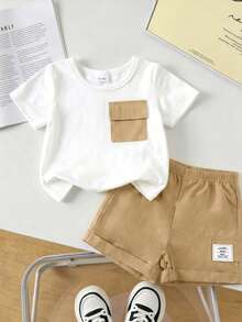 SHEIN Playful Pals Bộ 2 món unisex cho bé sơ sinh và trẻ nhỏ từ 0-3 tuổi, gồm áo tay ngắn cổ tròn và quần short cạp chun, thích hợp cho các hoạt động thể thao ngoài trời, đi chơi, mua sắm và du lịch. Phù hợp cho bé trai/bé gái từ 6 tháng đến 2-3 tuổi. - Màu Khaki - Xem 6