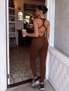 Easithlete Bộ jumpsuit nữ gợi cảm với dây chéo lưng. - Cà phê nâu - Xem 1