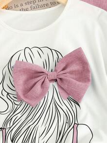 SHEIN 儿童/少女两件套：宽松针织上衣，饰有肖像和蝴蝶结印花，搭配阔腿裤，适合春夏穿着，可用于外出、聚会、度假，展现清新少女风，也是返校季的理想选择。 - 粉色 - 查看 6