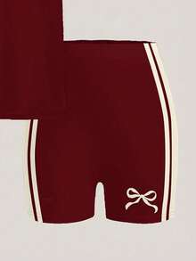 Conjunto de camiseta de manga corta holgada de cuello redondo y mallas tipo shorts ajustados para niña preadolescente, con estampado de mini lazos y rayas de contraste en rojo, de estilo minimalista y cómodo, adecuado para uso diario, estilo callejero, salidas, hogar, vacaciones, deportes, regreso a clases, primavera y verano - Blanco - Ver 5