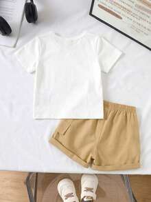 SHEIN Playful Pals Bộ 2 món unisex cho bé sơ sinh và trẻ nhỏ từ 0-3 tuổi, gồm áo tay ngắn cổ tròn và quần short cạp chun, thích hợp cho các hoạt động thể thao ngoài trời, đi chơi, mua sắm và du lịch. Phù hợp cho bé trai/bé gái từ 6 tháng đến 2-3 tuổi. - Màu Khaki - Xem 2