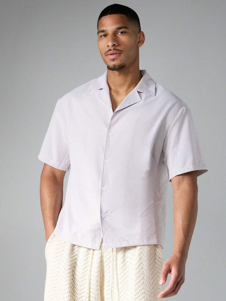 Chemise de camp à manches courtes, col cubain, rayée, coupe ample avec logo incurvé, pour l'été et les vacances