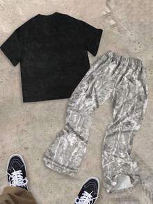 SHEIN Bolty 2025 Y2K 街头风青少年男童两件套 - 超大印花T恤和喇叭裤，朋克涂鸦，返校季，Z世代嘻哈复古运动套装，适合春夏男童嘻哈服饰，青少年男童服装套装，酷炫青少年男童套装，Y2K 男童服装套装 - 彩色 - 查看 2