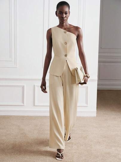 Aveloria Modichic Women's Asymmetric Single-Breasted Sleeveless Waistcoat And Straight-Leg Pants Suit Set, Beige Asymmetric Sleeveless Blazer, One Shoulder Design, Slim Fit, Suit Pants, Loose Straight Trousers, High-Quality Suiting Fabric, Minimalist Modern Style, Suitable For Formal Occasions, Business Meetings And Galas, Elegant And Capable, Spring And Autumn Seasons, Workwear Outfit.