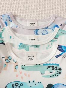 Bộ đồ ngủ 6 món ôm sát dành cho bé trai, với họa tiết cá mập đại dương, khủng long, tên lửa và hành tinh, chất liệu mềm mại và thoải mái, co giãn tốt, màu sắc tươi sáng và vui nhộn, phù hợp cho trẻ em. - Nhiều màu - Xem 4