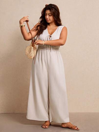 Elaquor Bộ jumpsuit không tay ống rộng màu trơn dành cho nữ cỡ lớn, thắt eo phía trước, phối ren tương phản.