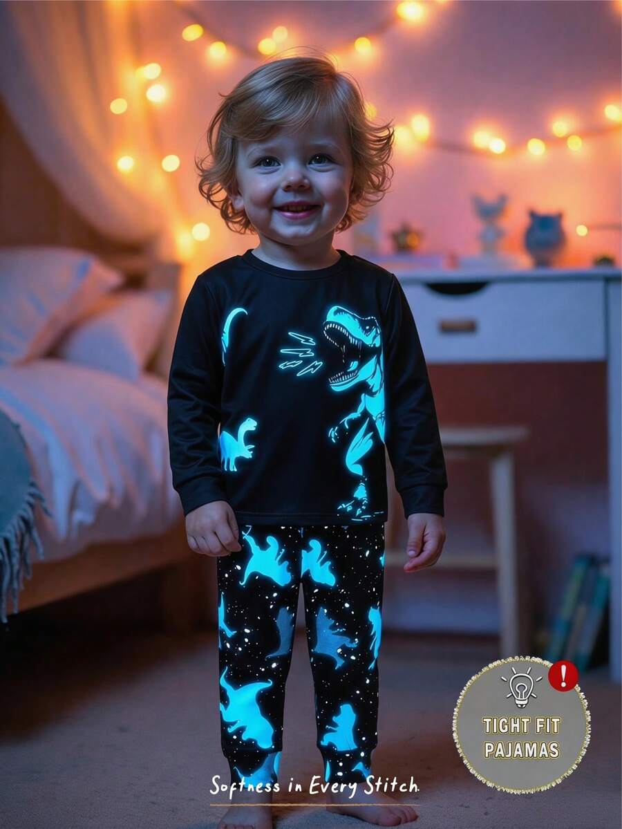 Cozy Pixies Conjunto de pijama de 2 piezas para bebé niño con parte superior de manga larga de cuello redondo y estampado de animales de dibujos animados que brilla en la oscuridad, y pantalones largos de cintura elástica ajustados - Multicolor - Ver 1