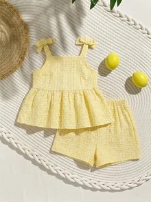 SHEIN Bộ 2 món thời trang cho thiếu nữ, kiểu dáng mới mùa xuân/hè, áo hai dây jacquard có dây rút và quần short jacquard cạp chun, thích hợp mặc đi nghỉ mát hoặc mặc hàng ngày. - Màu vàng - Xem 1