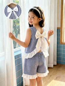 Bộ đồ cho bé gái tuổi teen: Áo không tay kẻ caro có bèo nhún và nơ trang trí, kèm quần short. - Nhiều màu - Xem 3