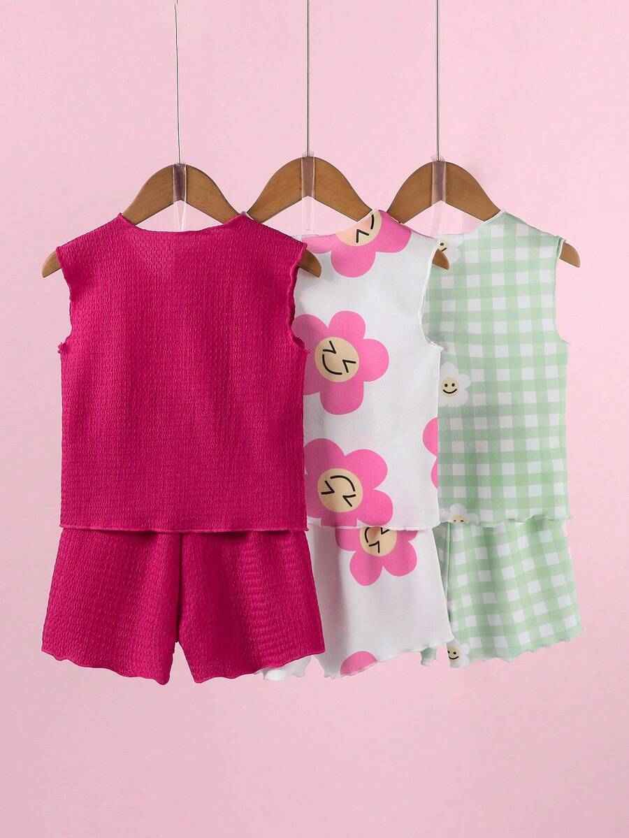 SHEIN Vintaside Kids 女童夏季无袖套装,清新舒适,居家户外皆宜:纯色玫红色套装,无袖上衣+配套短裤,宽松柔软,简约优雅。白色底色搭配粉色花朵图案,卡通元素活泼可爱,无袖设计清爽俏皮。浅绿色格子套装,饰以小脸图案,清新温柔,适合日常居家及户外穿着。 - 彩色 - 查看 1
