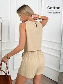 Easowa Bộ đồ gồm áo không tay khoét lỗ thêu họa tiết và quần short vạt chéo thắt nơ, kiểu dáng thanh lịch, thoải mái, phù hợp cho công sở, đi nghỉ dưỡng, phong cách xuân/hè dành cho nữ. - Màu be - Xem 8