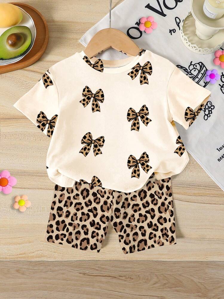 Bộ 2 món đồ mặc nhà thời trang ngọt ngào cho bé gái, áo thun ngắn tay và quần short bó sát, quần legging họa tiết da báo, thích hợp cho bé gái 4-7 tuổi vào mùa xuân/hè, áo thun in họa tiết da báo có nơ, thoải mái và thời trang, màu kaki và cà phê, phong cách thể thao. - trắng - Xem 3