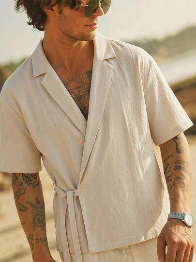 HIMLAND Men's Casual Summer Vacation Solid Color Lapel Collar Wrap Tie Short Sleeve Loose T-Shirt ,Wrap Shirt Men, Kimono Shirt Men, Tie Front Shirt, Cross Front Top, Linen Blend Short Sleeve, Textured Shirt Men, V Neck Summer Top, Lightweight Cardigan, Resort Wear Men, Beach Vacation Outfit, Boho Men's Clothing, Old Money Casual, Beige Textured Wrap Shirt With Tie Belt, Men's Short Sleeve Kimono Style Summer Cardigan, Cross Front Deep V Neck Casual Top, Effortless Quiet Luxury Vacation Shirt For Men, Bohemian Beachwear Kimono Shirt, Japanese Style Relaxed Fit Summer Clothing, Adjustable Waist Tie Shirt , Breathable Crinkle Fabric Top