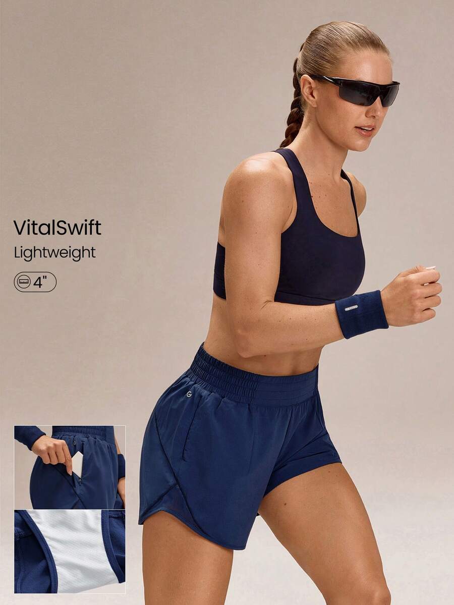 GLOWMODE Quần short chạy bộ VitalSwift 4 inch, siêu nhẹ, nhanh khô, cạp trung bình, có dây rút, phản quang, tích hợp quần lót khử mùi, túi khóa kéo, thích hợp cho các bài tập chạy bộ cường độ cao. - Dark Blue - Xem 1