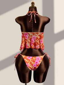 Zestiva Bộ bikini hai mảnh in họa tiết nhiệt đới dành cho nữ - Áo tắm cổ chữ V khoét sâu, viền ren và vạt bèo bất đối xứng, quần bơi cạp cao buộc dây bên hông, đồ bơi nghỉ dưỡng mùa xuân. Bộ tankini bèo nhún. Họa tiết hoa tương phản. Áo tắm in hoa. Họa tiết dâm bụt Hawaii. Áo tắm hoa phong cách Boho. - Nhiều màu - Xem 2