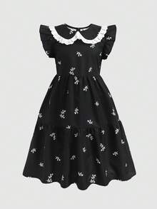 SHEIN Vestido informal y cómodo de manga abullonada con estampado floral ditsy y volantes de contraste suave para niñas preadolescentes, en estilo patchwork blanco y negro, con estilo princesa, para uso formal, conjunto a juego con hermana, vestido de fiesta, adecuado para uso diario, vacaciones, reuniones familiares y ocasiones especiales, estilo de hermanas, primavera/verano, lindo, elegante, dulce, retro, de moda. Conjunto a juego para mamá e hija, hermanas. - Negro - Ver 4