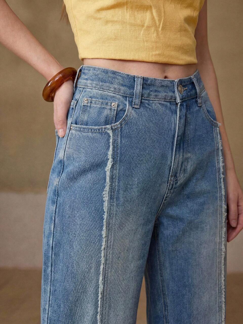WASHED RAW TRIM FLARE JEANS