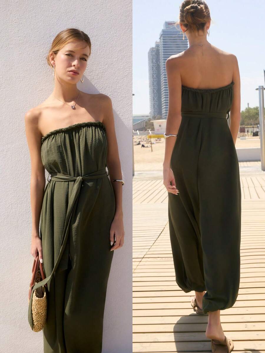Nöista Bộ jumpsuit màu xanh ô liu không dây, hở vai, điểm nhấn là phần cổ áo được tết bím và thắt lưng vải cùng màu để tôn dáng. Hoàn hảo cho mùa hè, mùa xuân, đi biển, tiệc bể bơi, phong cách boho, lễ hội mùa hè, hoặc mặc hàng ngày. - màu xanh lá - Xem 1