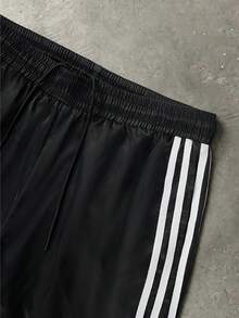 PAVTROS Quần short nam mùa hè phong cách casual sọc phối ghép, cạp chun dây rút, đi du lịch - màu đen - Xem 5
