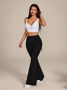 SHEIN PETITE Quần yoga 2 trong 1 màu đen co giãn dành cho nữ, có gấu váy xếp ly, ống loe, mùa xuân 2026. - màu đen - Xem 4