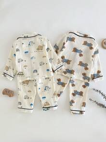 Bộ đồ ngủ 2 mảnh cho bé trai - Họa tiết động vật dễ thương, cài cúc, tay dài, cổ tròn, quần dài, hai mảnh, đồ mặc nhà nhẹ nhàng, ấm áp, mặc hàng ngày, mọi mùa, kỳ nghỉ 2026, món đồ không thể thiếu, mềm mại, thoải mái cho giờ chơi và giờ ngủ. - Màu be - Xem 2