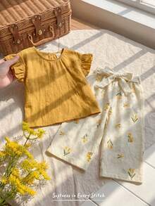 Cozy Pixies Conjunto de 2 piezas para bebé niña con top sin mangas de cuello redondo con volantes y pantalones de cintura elástica de unicolor - Amarillo - Ver 9