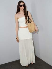 MOTF PREMIUM Bộ 2 món gồm áo croptop dệt kim nhún bèo và chân váy maxi chữ A, thích hợp cho kỳ nghỉ xuân/hè. - Màu be - Xem 4