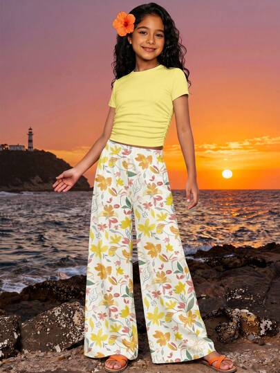 Tween Girl Spring/Summer Fashion Beach Vacation Solid Color Ruffle Cropped Short Sleeve T-Shirt And Floral Print Wide Leg Pants Set