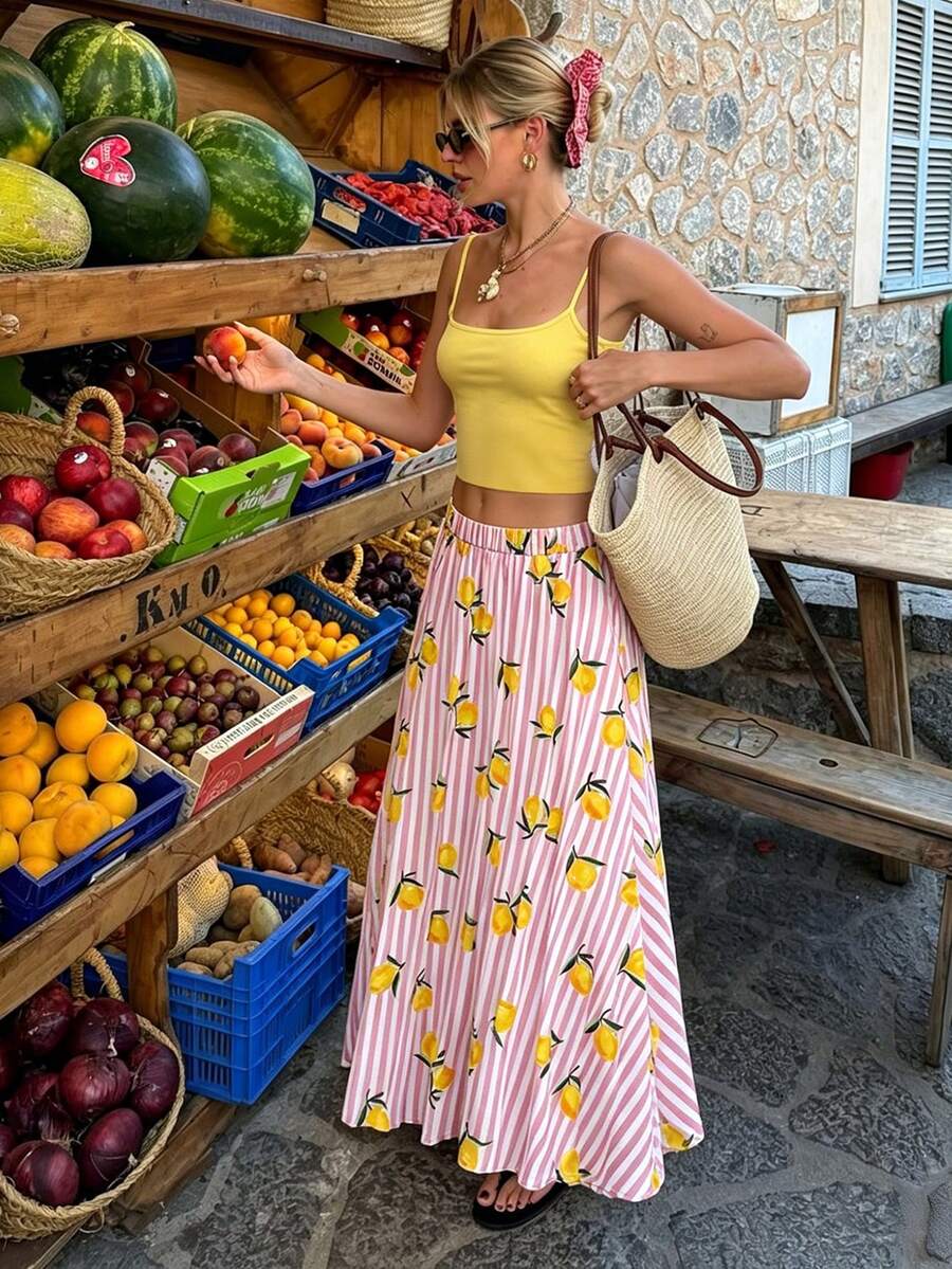 SHEIN LUNE Bộ 2 món gồm áo hai dây màu trơn và chân váy ngắn họa tiết chanh & sọc dành cho nữ. - Nhiều màu - Xem 1