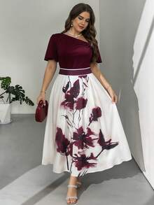 Modelyn Bộ đồ 2 món thanh lịch dành cho nữ cỡ lớn, màu trơn, trang trí kim loại, cổ áo bất đối xứng, tay ngắn và chân váy midi in hoa. - Nhiều màu - Xem 9
