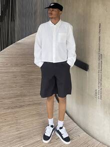 Ngobest Haus Ngobest Haus Jeune style de rue pour hommes, chemise à manches courtes polyvalente de couleur unie, convenant pour le streetwear, les tenues décontractées du quotidien, les sorties du week-end, les festivals de musique, les rassemblements sociaux et plus encore. Cette chemise est une pièce polyvalente essentielle dans la garde-robe d'un homme, en faisant un excellent cadeau pour les petits amis ou les maris. - Blanc - Voir 3