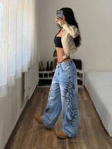 SHEIN Jeans acampanados con estampado vintage para mujer de talla grande - Lavado ligero - Ver 1