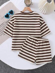 SHEIN LMoss Kids Set de 2 piezas de camiseta holgada de cuello redondo de unicolor y shorts ajustados para niña joven - Blanco y Negro - Ver 6