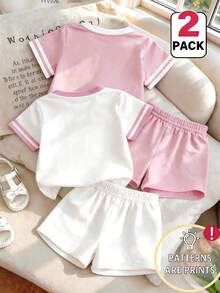 SHEIN Playful Pals Bộ áo và quần short in hình hoa dâu tây và trắng cho bé gái, kiểu dáng mùa hè thoải mái, phù hợp cho mùa xuân, hè, thu, màu trắng và hồng, trang phục thường ngày giản dị, bộ đồ dễ thương thời trang cho bé gái, phù hợp cho mọi mùa, bộ 2 món đáng yêu cho kỳ nghỉ. - Nhiều màu - Xem 2