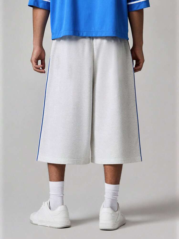 Bequeme, Oversized Fleece-Jogginghose mit Seitenstreifen, Kordelzug in der Taille und Seitentaschen als Freizeitkleidung