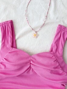 SHEIN 儿童及青少年女孩粉色纯色针织扭结前片露脐上衣搭配碎花宽松A字层叠半裙两件套，适合春夏海滩、邮轮、度假穿着。 - 粉色 - 查看 8