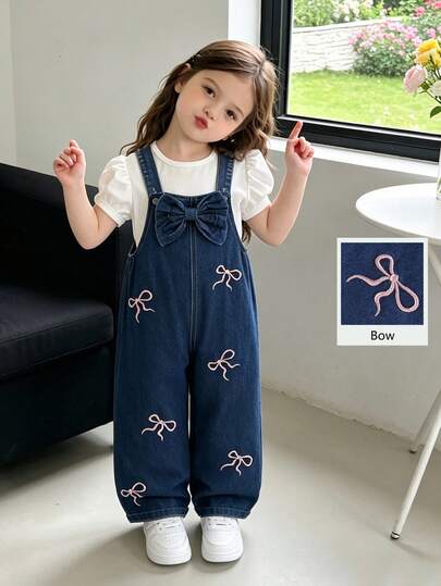 SHEIN Pantalones de peto de mezclilla de estilo versátil para niñas jóvenes, color azul denim medio vintage, múltiples decoraciones con bordados de lazos rosas, diseño de lazo grande en la parte delantera, pierna recta holgada, tela suave y cómoda, adecuado para uso diario, escuela, transporte, primavera/verano/otoño/invierno