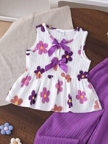 SHEIN Elladie kids 两件套女童碎花蝴蝶结无袖套装，白色碎花无袖露脐上衣搭配紫色阔腿裤，缎面蝴蝶结装饰，活力甜美女孩风格，适合日常外出、游乐园、家庭聚会等场合，是幼儿夏季吸睛穿搭。 - 紫色 - 查看 7
