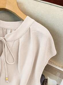 GlowEve CURVE Camiseta sin mangas de mujer talla grande, elegante, de unicolor, con cuello redondo, contraste de color y cordón ajustable - Albaricoque - Ver 7