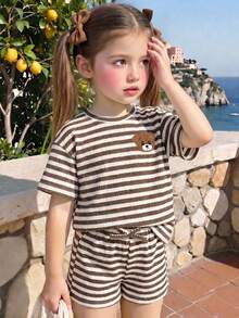 SHEIN LMoss Kids Set de 2 piezas de camiseta holgada de cuello redondo de unicolor y shorts ajustados para niña joven - Blanco y Negro - Ver 2