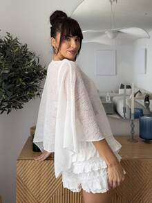 Marta Soriano Novo top de saia estilo xale versátil em jacquard de damasco, com decote halter e gola xale, ideal para diversas ocasiões e férias. Leve e confortável. - Branco - Ver 4