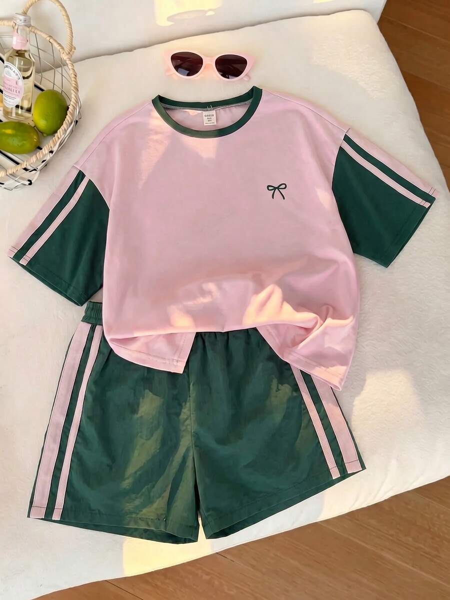 SHEIN 少女运动风粉色和深绿色撞色短袖T恤短裤套装,夏季,宽松修身设计,轻薄面料,适合日常穿着、休闲运动或搭配。 - 彩色 - 查看 1