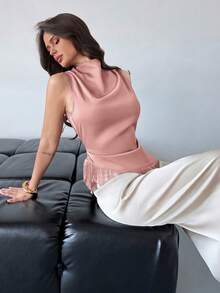 Firerie Áo không tay nữ kiểu dáng thanh lịch, thoải mái, thích hợp đi làm, đi nghỉ mát, đi biển, phong cách bohemian, màu nâu satin, cổ xếp ly, vạt áo tua rua bất đối xứng, ôm sát người, thời trang thanh lịch, đa năng, trang phục giáo viên, áo vest nữ. - Màu Hồng baby - Xem 4