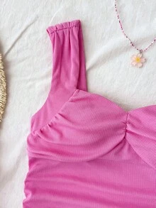 SHEIN 儿童及青少年女孩粉色纯色针织扭结前片露脐上衣搭配碎花宽松A字层叠半裙两件套，适合春夏海滩、邮轮、度假穿着。 - 粉色 - 查看 4