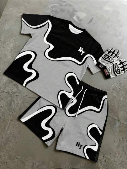 Manfinity EMRG Conjunto casual de camiseta de manga corta con estampado de letras y pantalones cortos para hombre