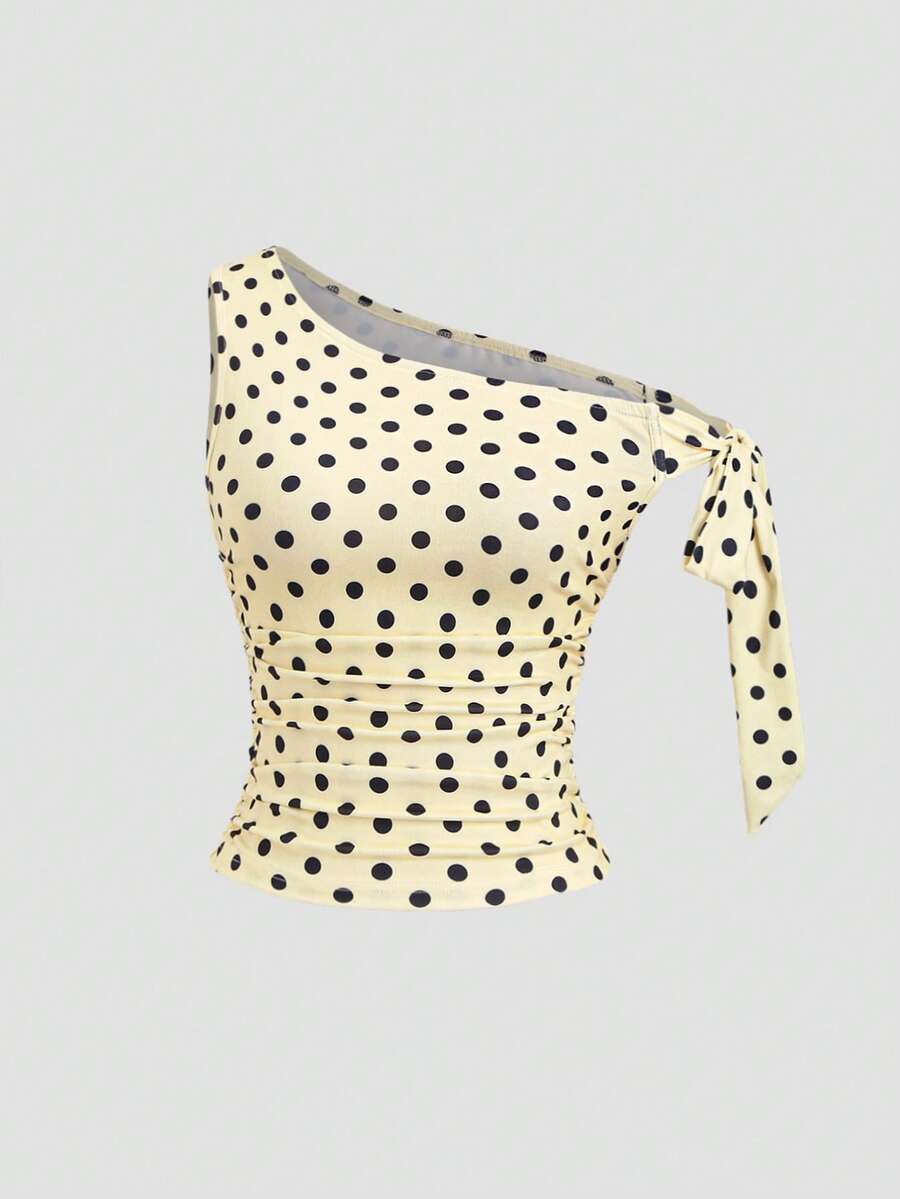 Sweetra Camiseta ajustada con diseño de hombro asimétrico con lazo y cintura ceñida con estampado de lunares, con un estilo retro elegante, adecuada para primavera/verano, estilo europeo y americano - Amarillo - Ver 1