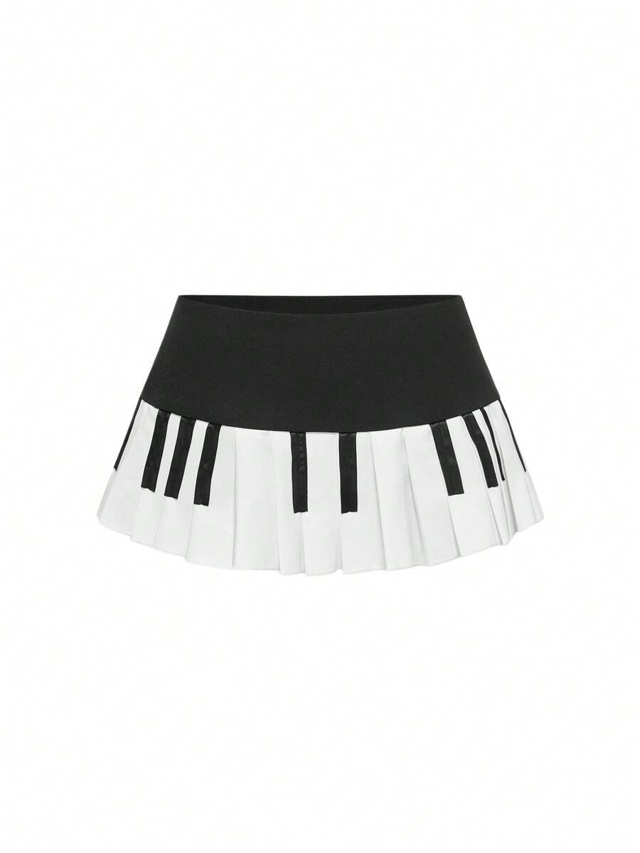 ROMWE Grunge Punk Minifalda micro Y2K para mujer, vestido con estampado de teclado de piano plisado de cintura ultra baja y vintage - Blanco y Negro - Ver 1